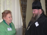 Иеромонах Никон поздравляет О.Н. Куликовскую-Романову.