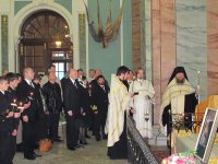 Во время панихиды.