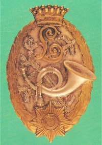 Корпусным знаком является охотничий рожок на обеих петлицах