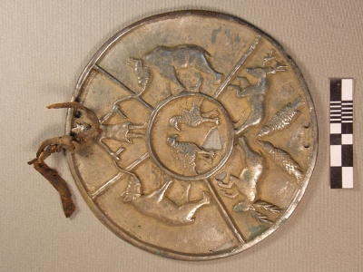 Бляха производства русских мастеров (товар для обмена). Имитирует китайские зеркала раннего железного века