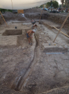 Раскоп 4/D. Чистка канала водовода, вид с запада.