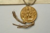 Вислая литая золотая печать с рельефными изображениями Максимилиана I на троне на аверсе и государственного герба на реверсе. Диаметр печати 8,5 см