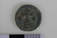 Реверс литой медной монеты Романа IV (1068-1071).